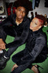 Black Velour Track Set Luxury Style & All-Day Comfort worn by a stylish couple, showcasing unisex luxury and comfort.