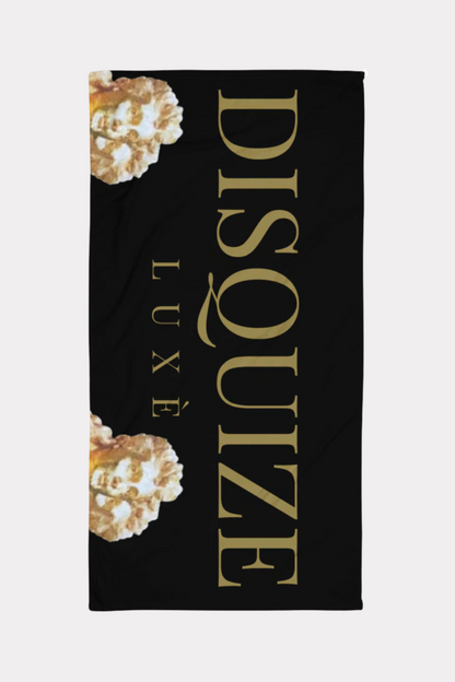 Black and gold DISQUIZE luxury beach towel with signature logo design