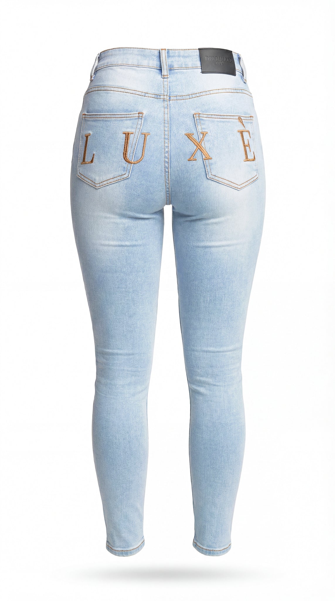 Women's light wash distressed LUXE denim jeans with tailored fit