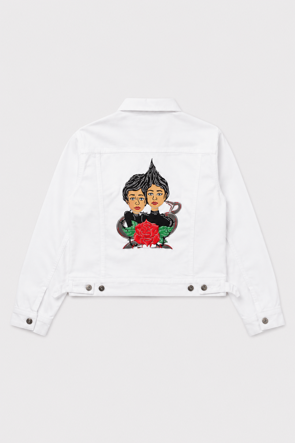 White denim jacket with artistic graphic design on the back
