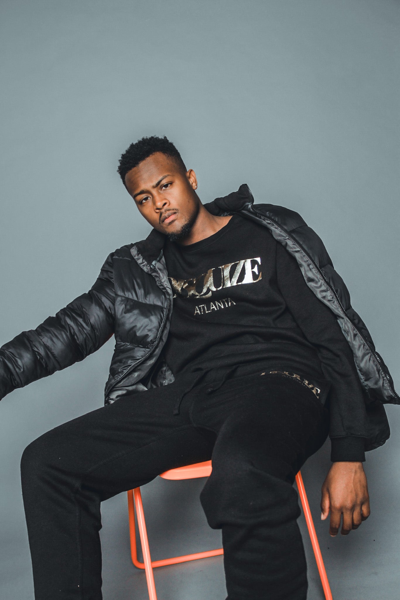 Black DISQUIZE sweat suit with matching crewneck and joggers